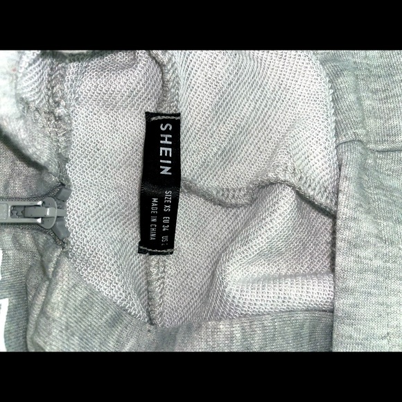 I’m selling a grey and green cropped hoodie, size extra-small. - Picture 3 of 3